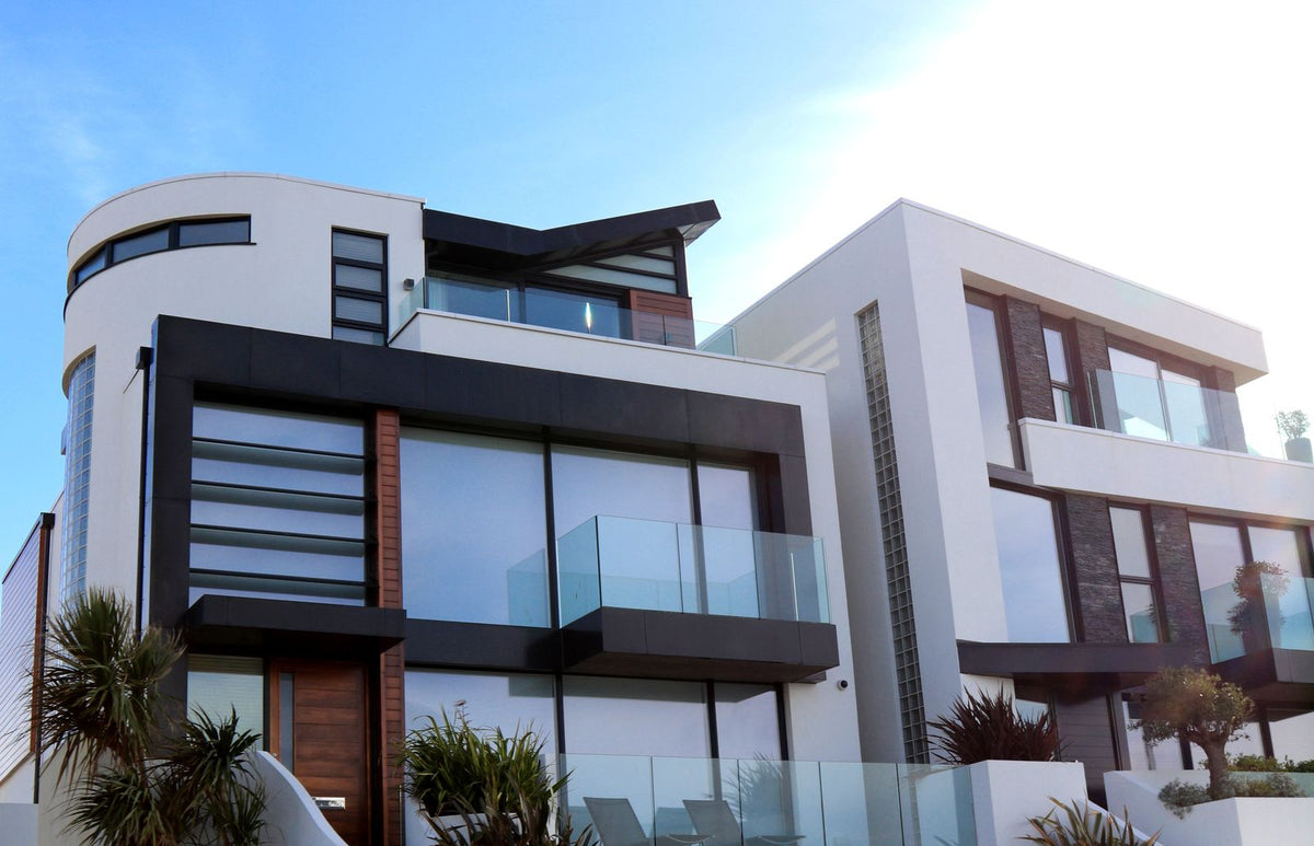 Contemporary home with glass balconies