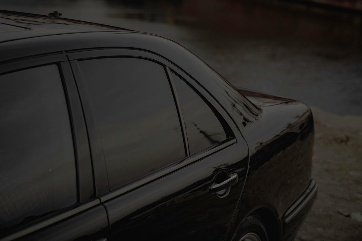 Black car with tinted windows