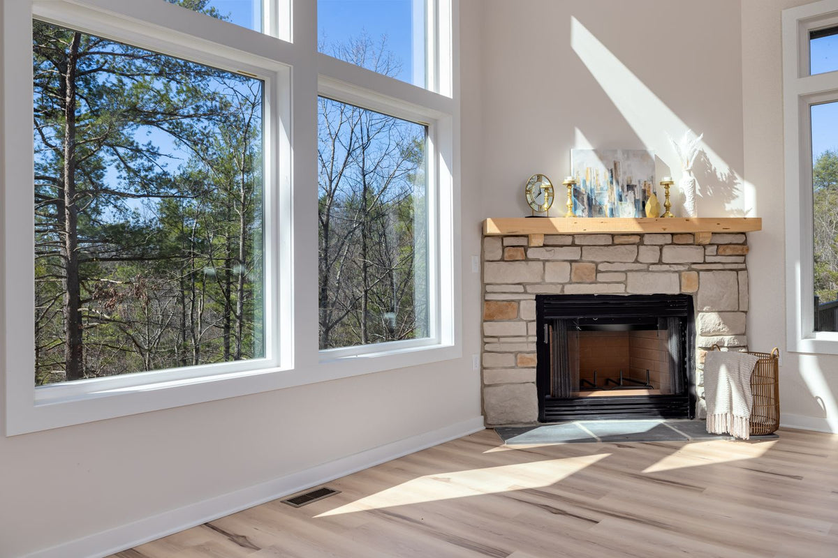 Sunlit living room with large windows